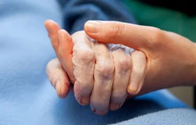 1444x920_a-young-hand-touches-and-holds-an-old-wrinkled-hand-4148r-706.webp
